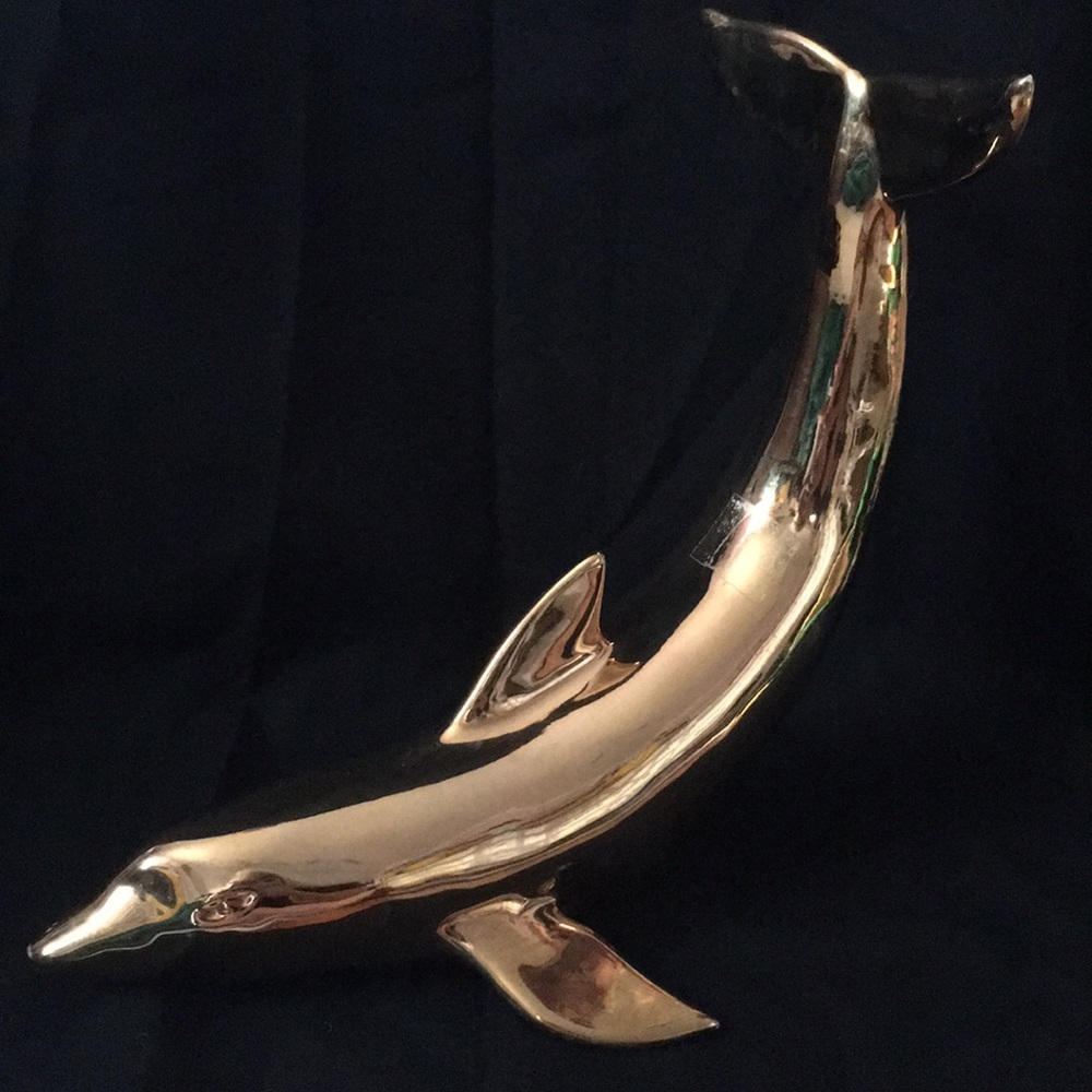 Decorative dolphin made of painted ceramic